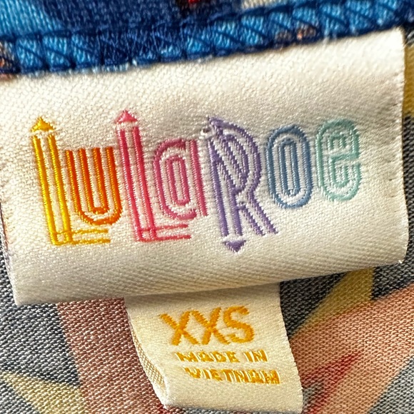 LuLaRoe Top Classic Drop Tail Short Sleeve Tee Size XXS Vibrant Colorful Stars - Picture 15 of 16